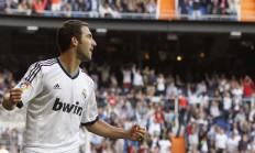 开云足球直播-赛场风云录，德国队险胜背后的博弈，桃田贤斗如何刷新羽坛纪录